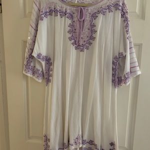 White linen dress with purple embroidery